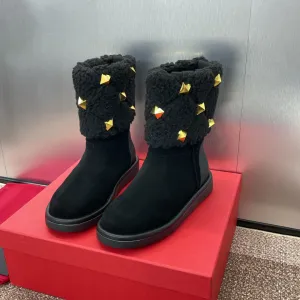 ANKLE STUDDED BOOTS IN BLACK SUEDE AND SHEARLING LINING