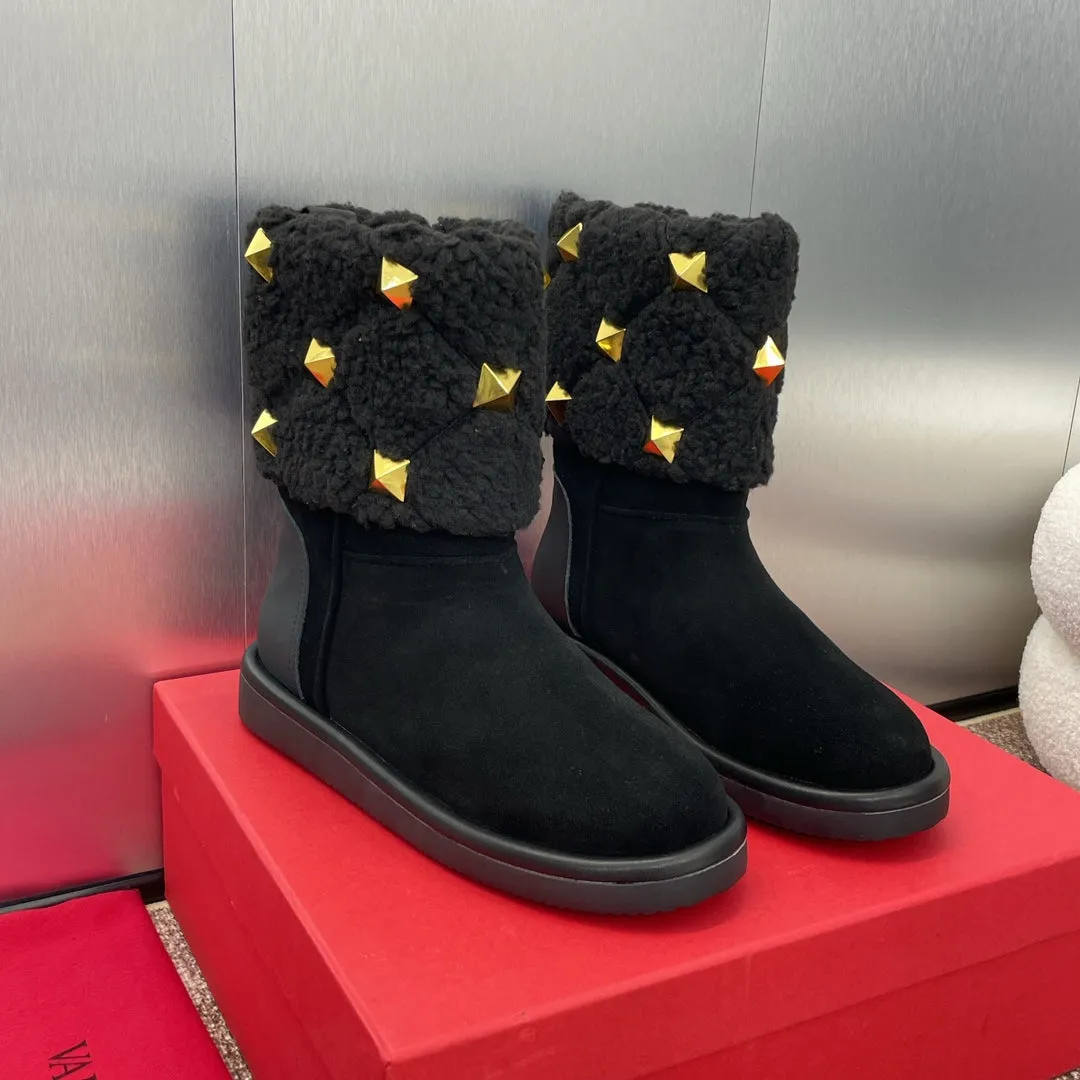 ANKLE STUDDED BOOTS IN BLACK SUEDE AND SHEARLING LINING