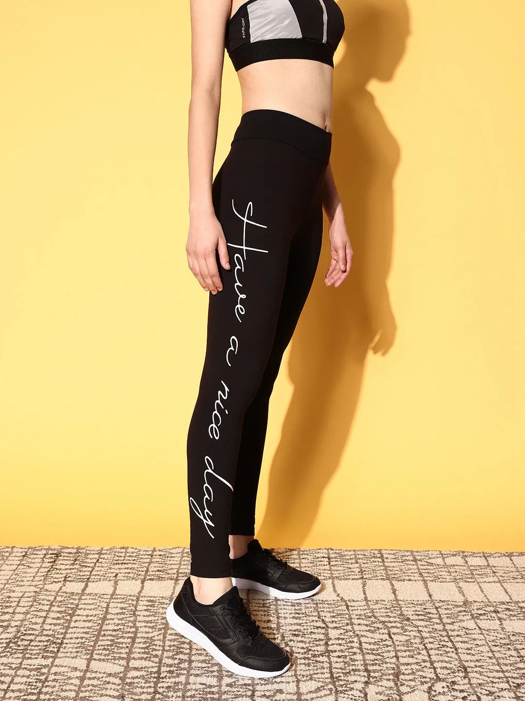 Berrylush Women Black Typography Printed Elastic High-Rise Waist Slip-On Regular Sports Tights